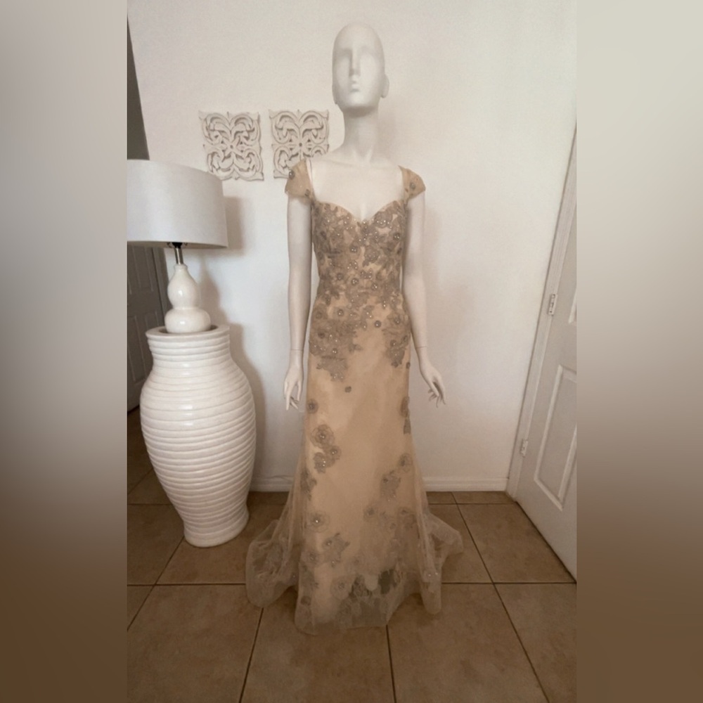 Elegant Cream Wedding Dress with Gold Embellishments